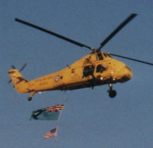 An RAF Wessex helicopter in a fly past tribute